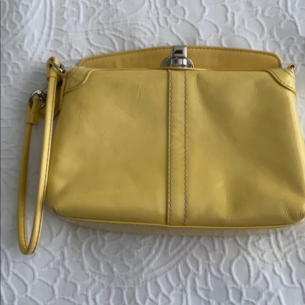 yellow coach wristlet